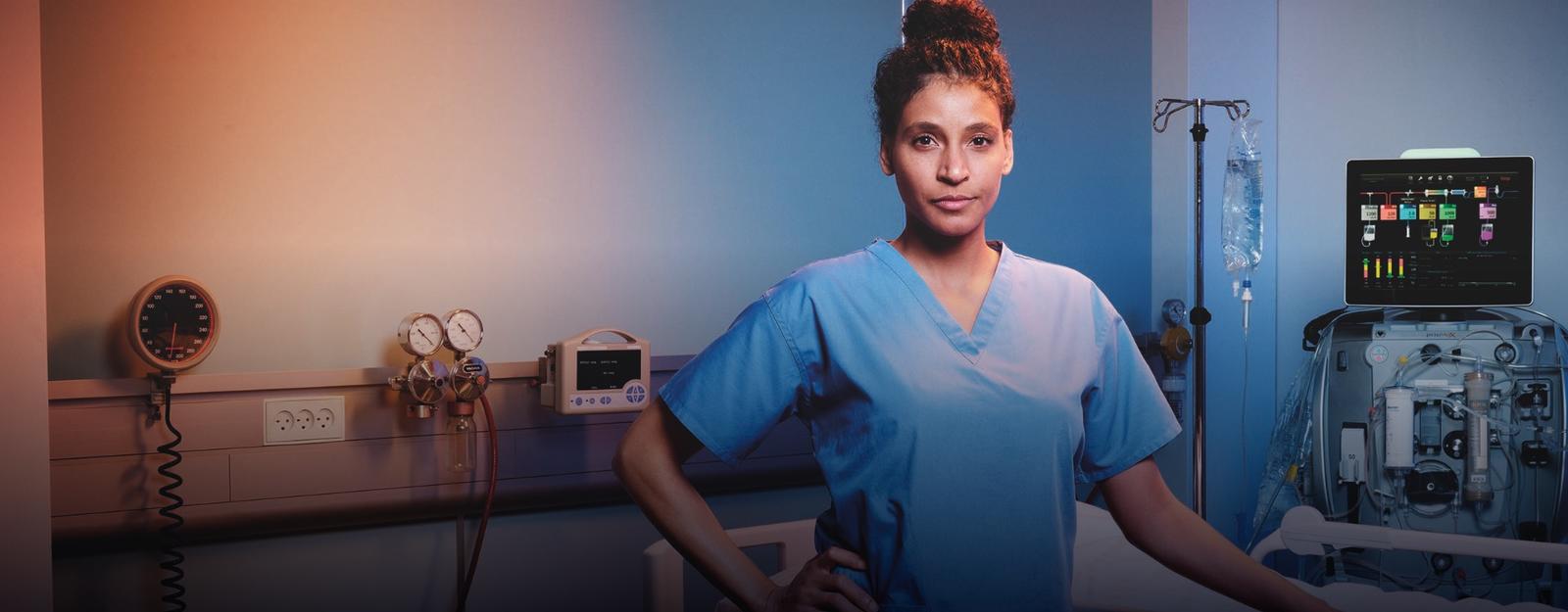 Doctor walking out of the ICU room. Patient bed in the background				